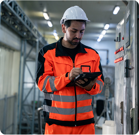 Worker gaining real-time visibility from factory systems